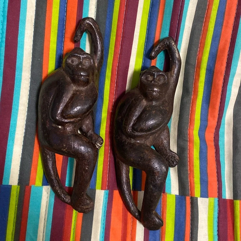 2- Cast iron monkeys, approximately 6” x 2” fast shipping